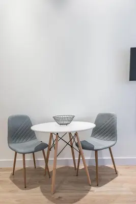 Una televisión o centro de entretenimiento en Acogedor Apartamento en Azca QA