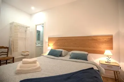Cama o camas de una habitación en Apartamentos corazón de Chamberí