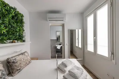 Cama o camas de una habitación en Waou Canalejas es MIA - Corta Duración