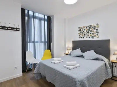 Cama o camas de una habitación en Alcam Madrid Palencia