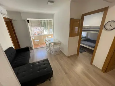 Cama o camas de una habitación en Piso en calle Álvarez de la Ribera 18