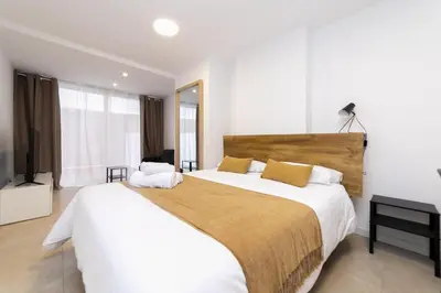 Cama o camas de una habitación en Regency VII - Ferga Suites