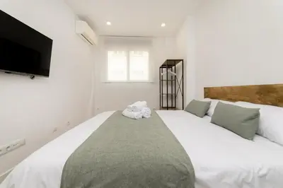 Cama o camas de una habitación en Luxury III - Ferga Suites