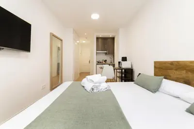 Cama o camas de una habitación en Luxury IV - Ferga Suites