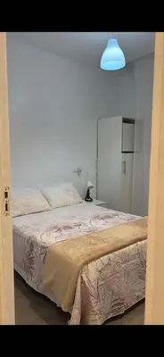 Cama o camas de una habitación en Hostal Conchita