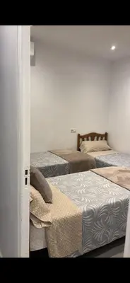 Cama o camas de una habitación en Hostal Conchita