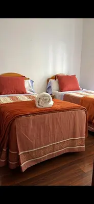 Cama o camas de una habitación en Hostal Conchita