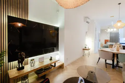 Una televisión o centro de entretenimiento en Luxury central apartment