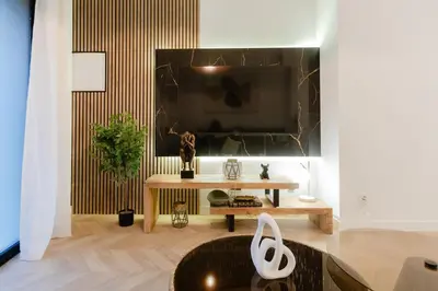Una televisión o centro de entretenimiento en Luxury central apartment