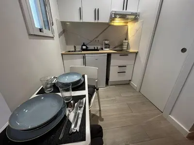 Una cocina o zona de cocina en Hermoso apartamento estudio en el centro de Madrid