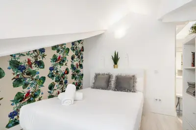 Cama o camas de una habitación en Charming Apartment in Heart of Madrid