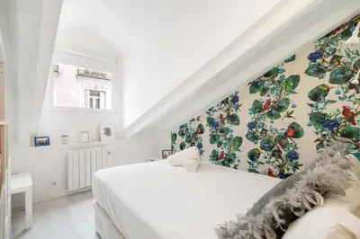 Cama o camas de una habitación en Charming Apartment in Heart of Madrid