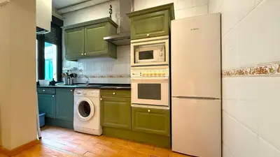 Una cocina o zona de cocina en Charming apartment close to Royal Palace - Rolland