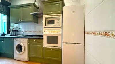 Una cocina o zona de cocina en Charming apartment close to Royal Palace - Rolland