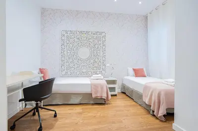 Cama o camas de una habitación en Alcam Madrid Moncloa