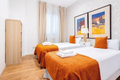 Cama o camas de una habitación en Alcam Madrid Moncloa