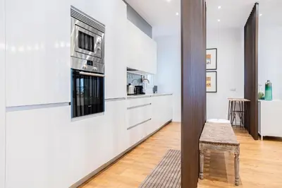Una cocina o zona de cocina en Alcam Madrid Moncloa