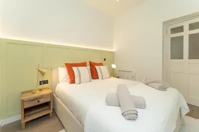 Cama o camas de una habitación en Piso a pocos pasos del Retiro