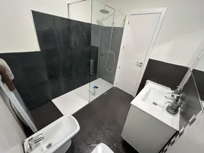 Un baño de Habitaciones en Embajadores