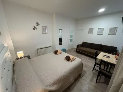 Cama o camas de una habitación en Habitaciones en Embajadores
