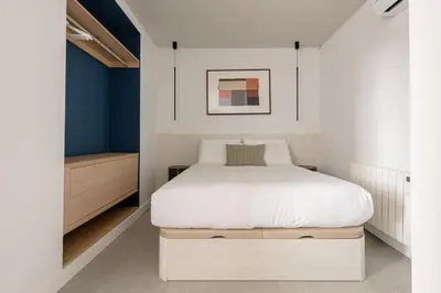 Cama o camas de una habitación en Moderno y Luminoso piso cerca al Paque del Retiro