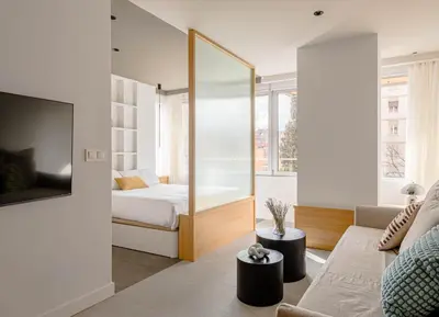Cama o camas de una habitación en Espectacular piso cerca al parque del Retiro