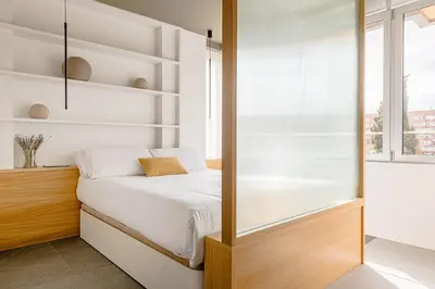 Cama o camas de una habitación en Espectacular piso cerca al parque del Retiro