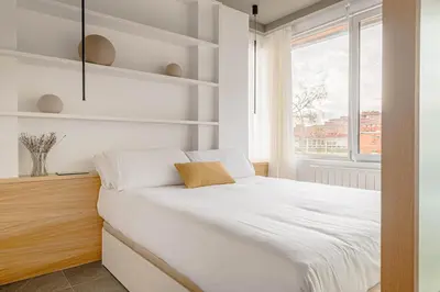 Cama o camas de una habitación en Espectacular piso cerca al parque del Retiro