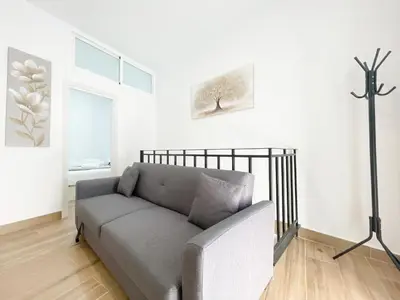 Cama o camas de una habitación en Cerca del centro y luminoso