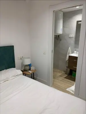 Cama o camas de una habitación en Modern & cozy 1 bedroom apartment in Malasaña