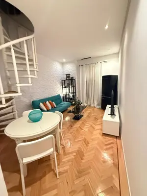 Una televisión o centro de entretenimiento en Apartment in Chueca