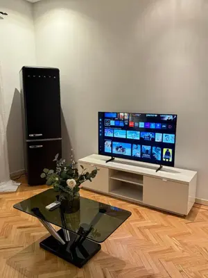 Una televisión o centro de entretenimiento en Apartment in Chueca