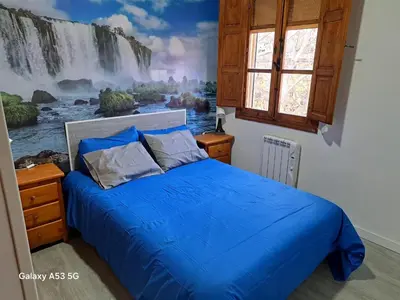 Cama o camas de una habitación en La chocita de Eva