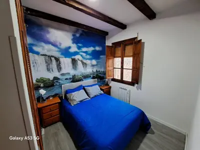 Cama o camas de una habitación en La chocita de Eva
