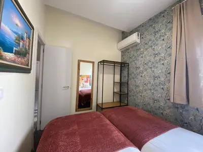 Cama o camas de una habitación en Relojeros