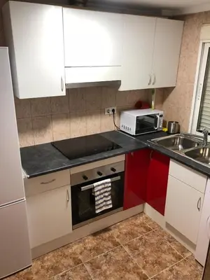 Una cocina o zona de cocina en Apartamento céntrico bajo