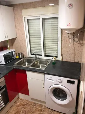 Una cocina o zona de cocina en Apartamento céntrico bajo