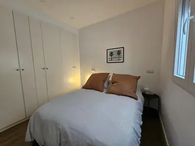 Cama o camas de una habitación en Cozy Apartment Madrid