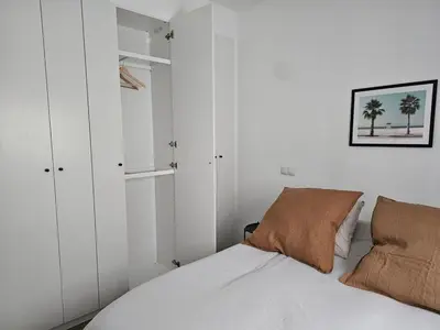 Cama o camas de una habitación en Cozy Apartment Madrid