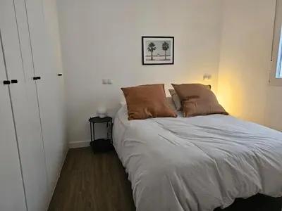 Cama o camas de una habitación en Cozy Apartment Madrid
