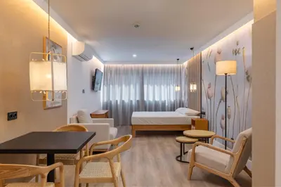 Cama o camas de una habitación en HA Retiro Suites