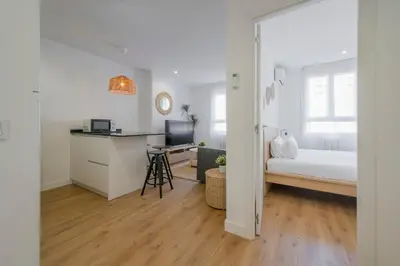 Cama o camas de una habitación en Elegancia con parking para 4, vive La Latina