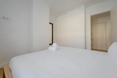 Cama o camas de una habitación en Elegancia con parking para 4, vive La Latina