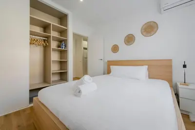 Cama o camas de una habitación en Elegancia con parking para 4, vive La Latina