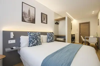 Cama o camas de una habitación en Dobo Madrid Río