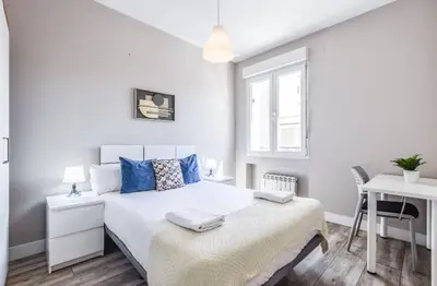 Cama o camas de una habitación en AH - Un rincón único en el Retiro para descansar con estilo