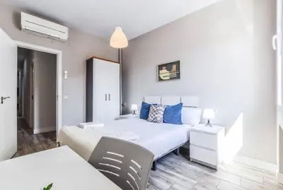 Cama o camas de una habitación en AH - Un rincón único en el Retiro para descansar con estilo