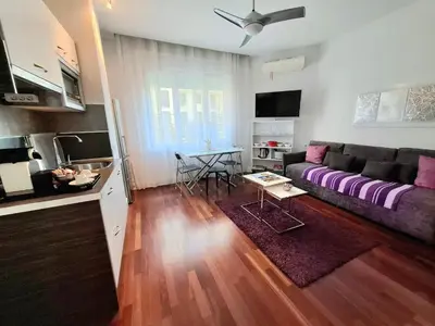 Una televisión o centro de entretenimiento en Gran Vía Exclusive Apartamento Temporal