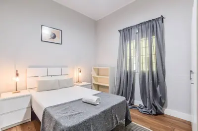 Cama o camas de una habitación en AH- Diseño y alma madrileña cerca a Plaza Mayor