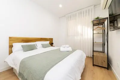 Cama o camas de una habitación en Luxury II - Ferga Suites